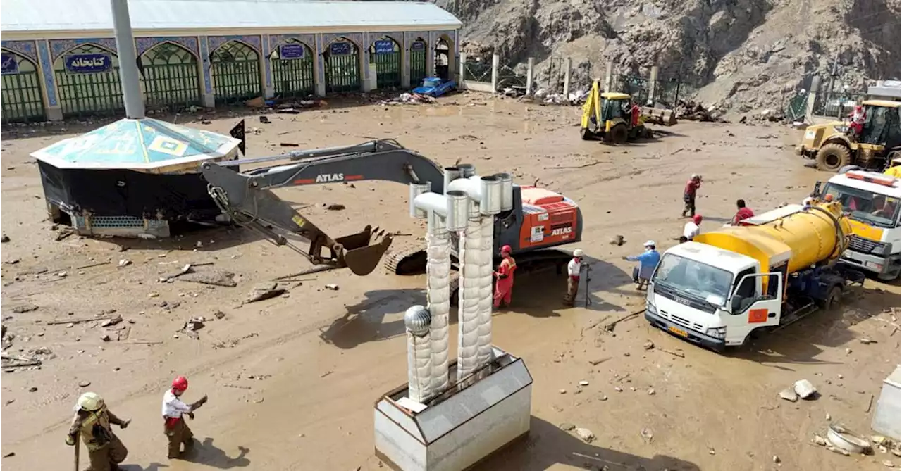 Rescuers search for landslide and flood victims after heavy rain in Iran