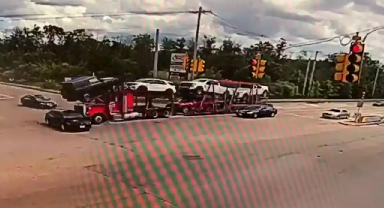 Speeding Car Carrier Runs Red Light, Sends Toyota Corolla Spinning | Carscoops