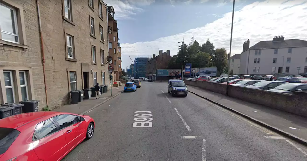 Woman found dead at Dundee home as police stand guard at scene