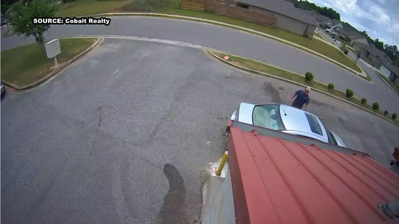 Security video shows suspect Austin Hall stealing a delivery driver’s car before Bibb County shootout