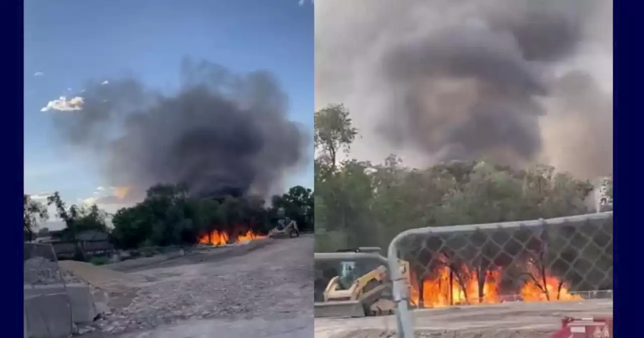 Brush fire spreads to carport, two sheds in Midvale