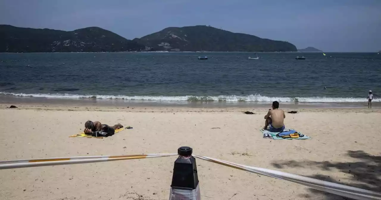 COVID-hit Macau reopens beaches but bans swimming