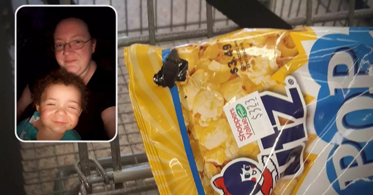 Woman finds snake inside popcorn bag at grocery store