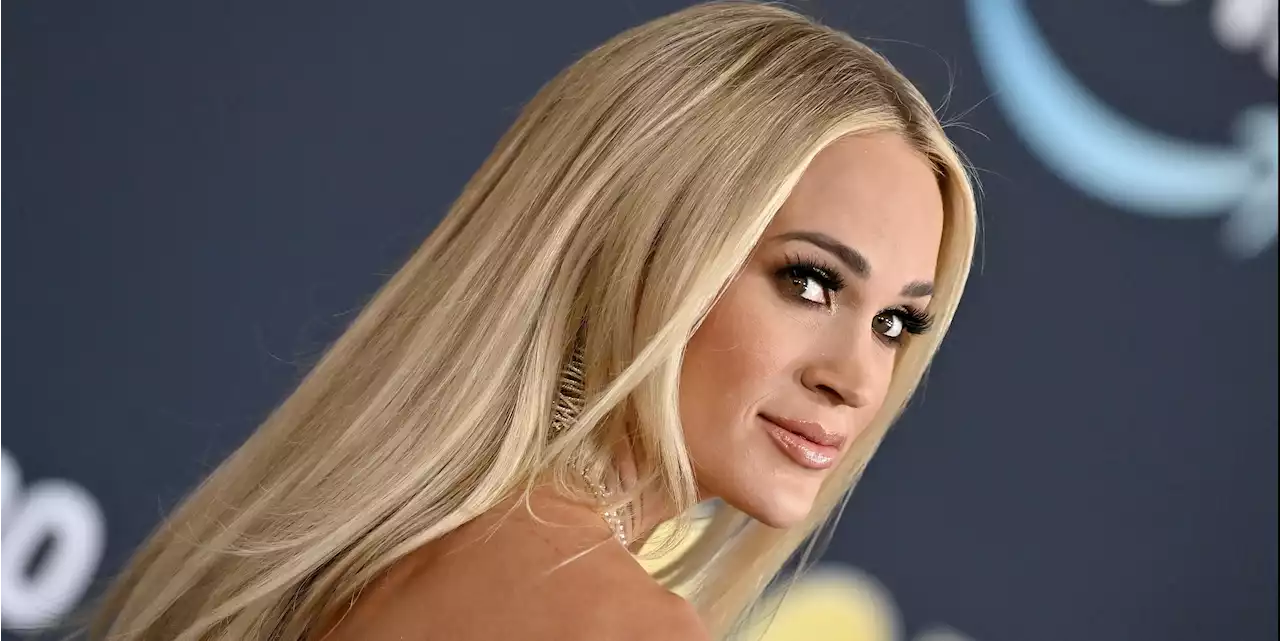 Fans Bombard Carrie Underwood’s Instagram After She Wears Dramatic Low-Cut Gown