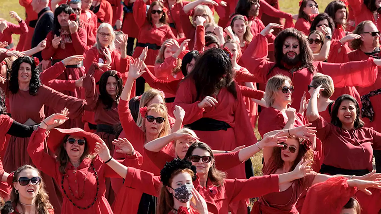 Kate Bush Fans Gather En Masse for Wuthering Heights Day, Dance in Red