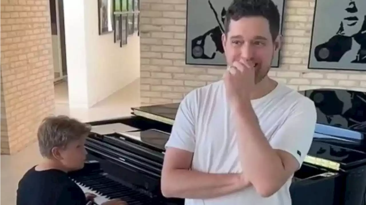 Watch Michael Buble fight back tears as son plays 'I'll Never Not Love You' on piano