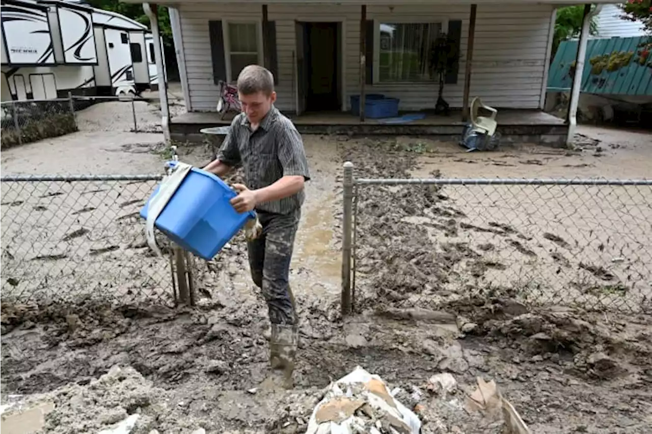 Some Appalachia residents begin cleanup after deadly floods