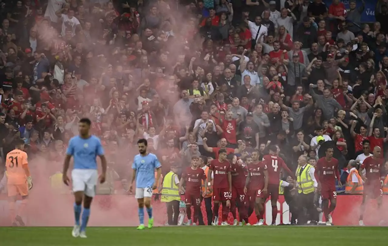 Soccer-FA investigates after flares let off during Community Shield