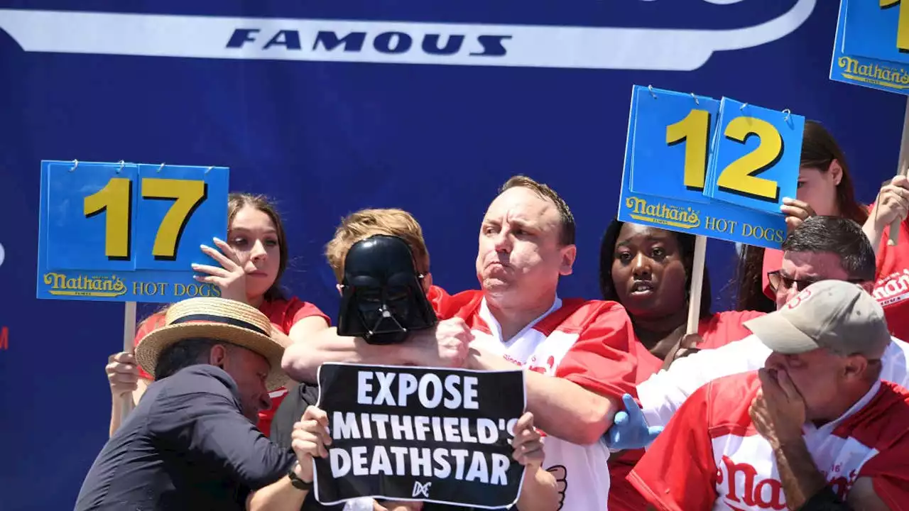 Joey Chestnut puts protestor in chokehold during Nathan’s Hot Dog Eating Contest