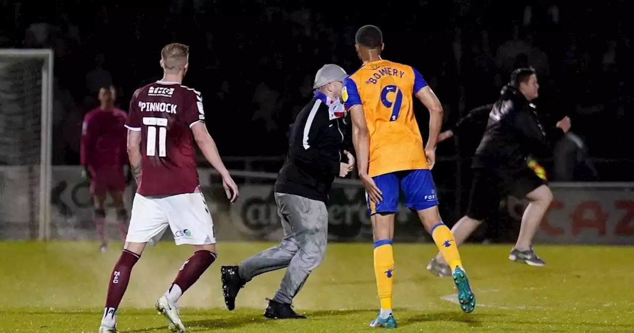 Cobblers pitch invader jailed over flare and player attack