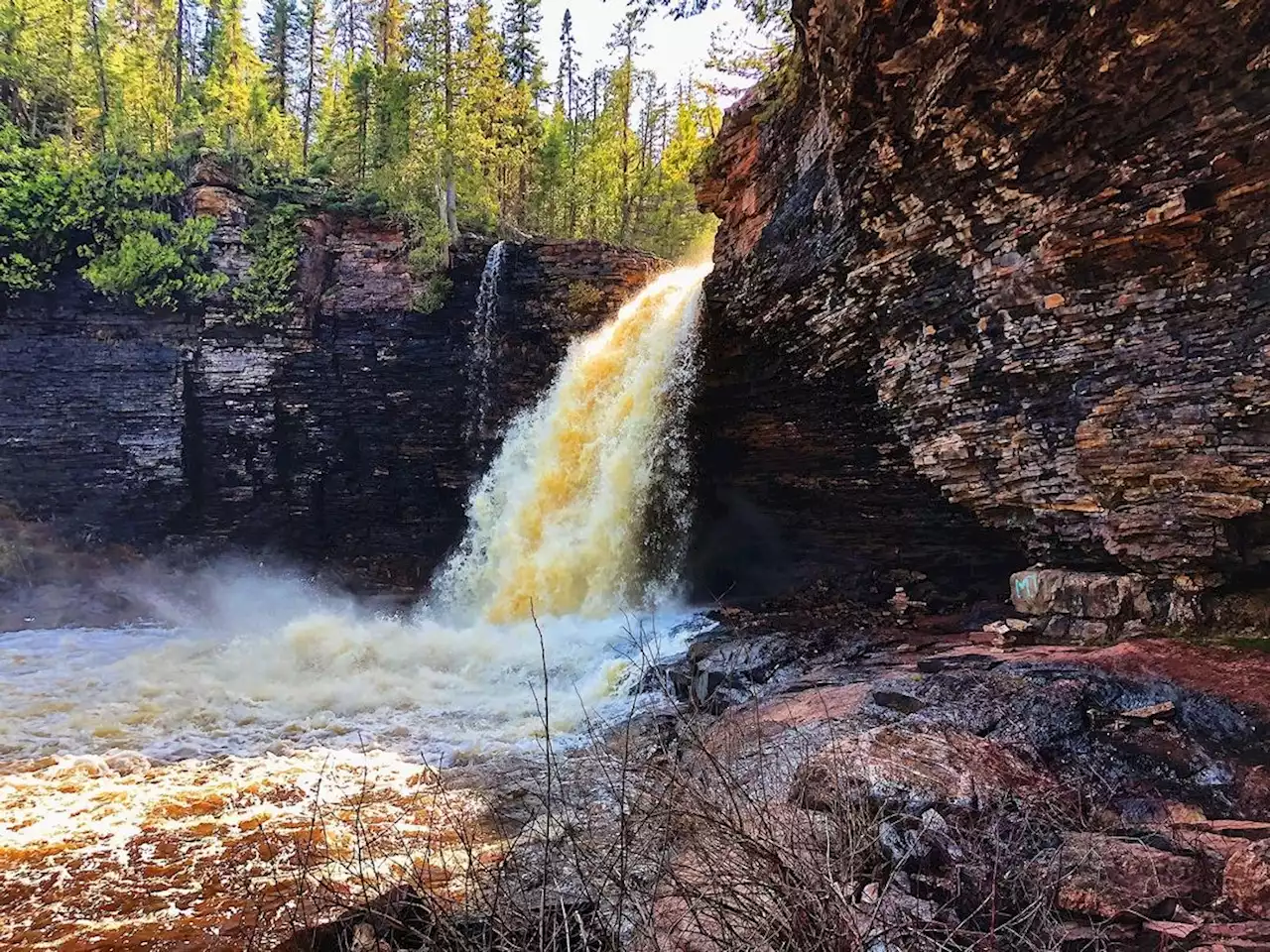 Woman who died at Wolf River Falls was trying to retrieve a drone