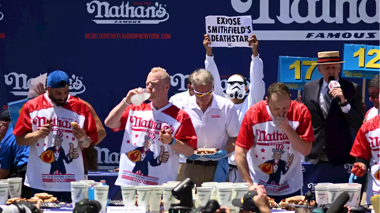 Joey Chestnut Puts Protester in Chokehold During Nathan’s Hot Dog Eating Contest