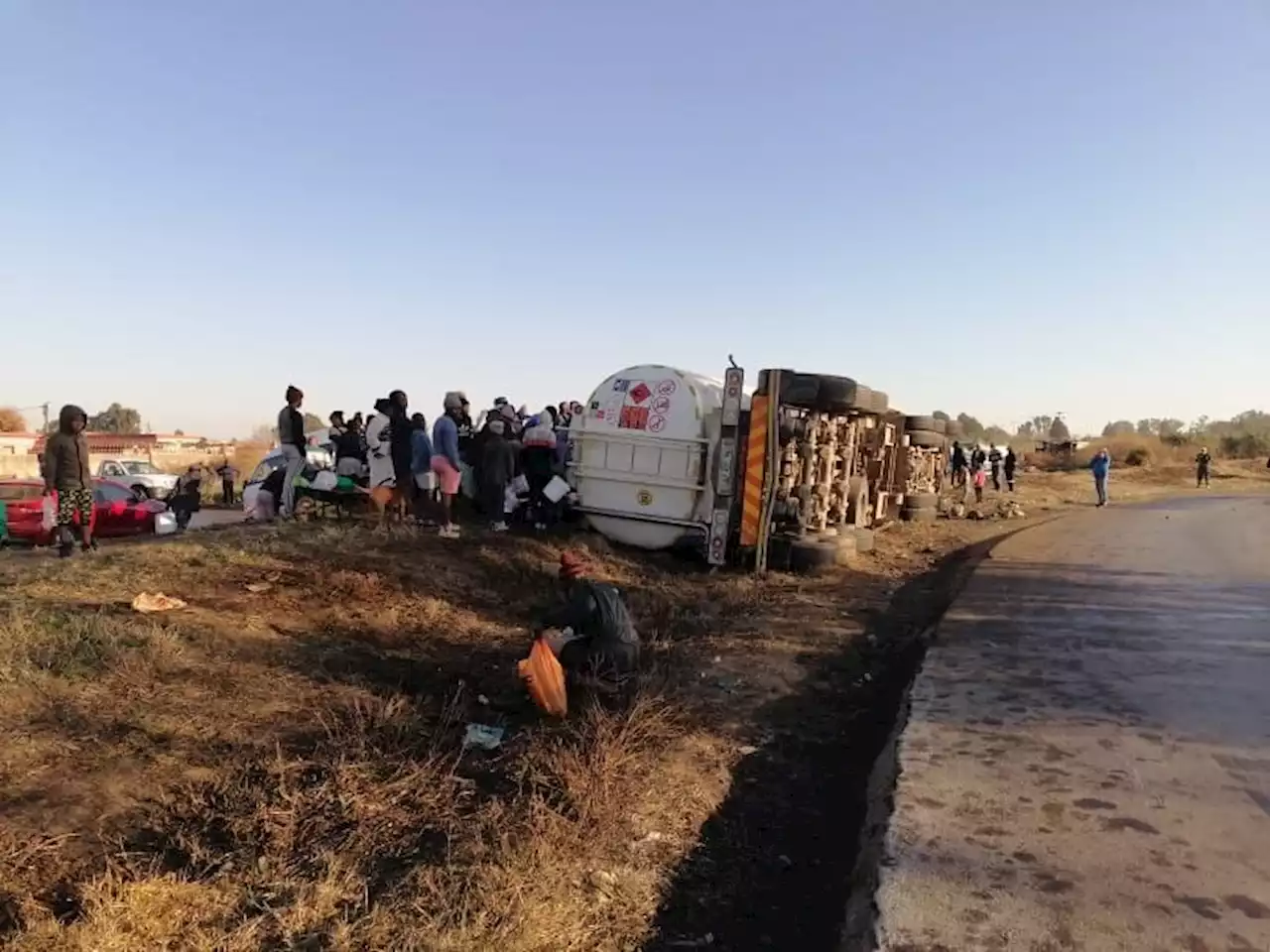 Tanker overturns in Free State, residents 'help themselves' to diesel | News24