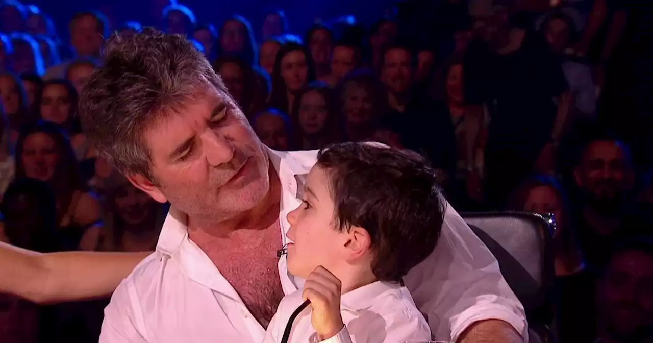 Simon Cowell's son does handstand challenge with mum Lauren and Amanda Holden