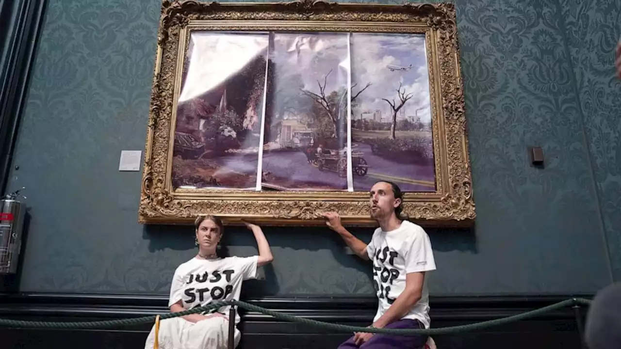 UK climate protesters glue themselves to gallery paintings