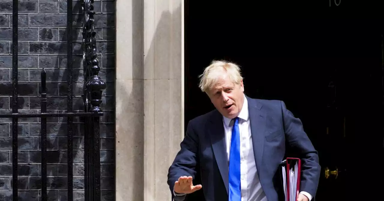 UK's Johnson battles to stay in job after top ministers quit