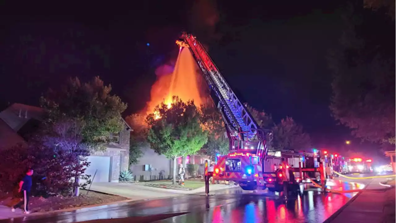 Firefighters battle house fire in West Bexar County