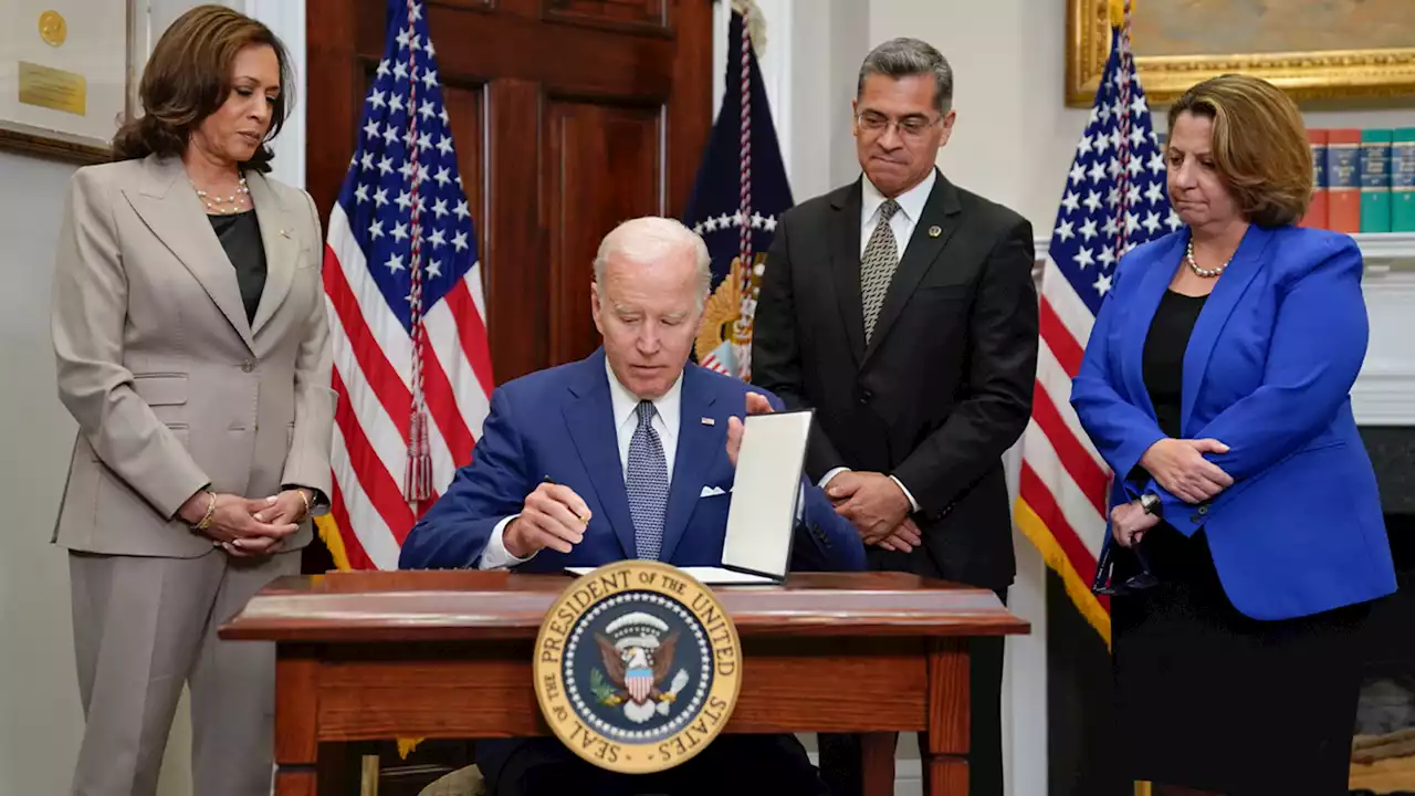 Biden signs executive order on abortion access after Supreme Court overturns Roe