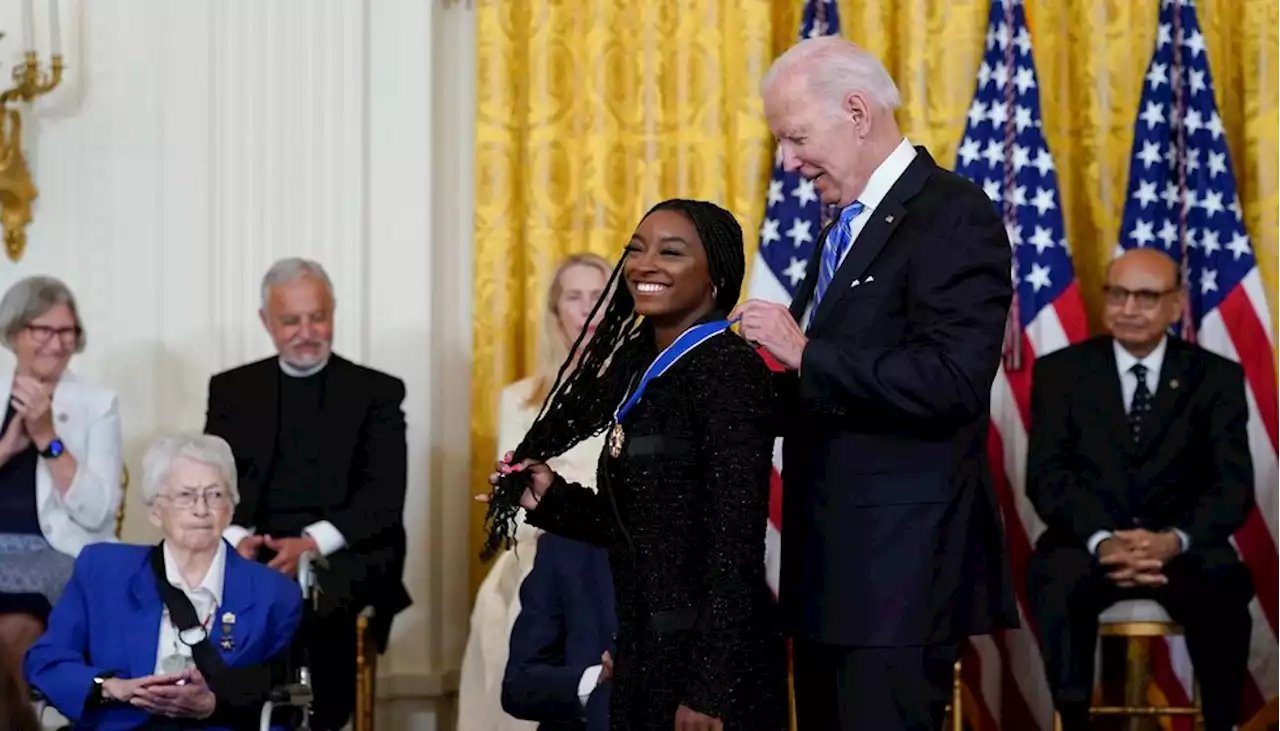 Biden awards Medal of Freedom to Biles, McCain, Giffords