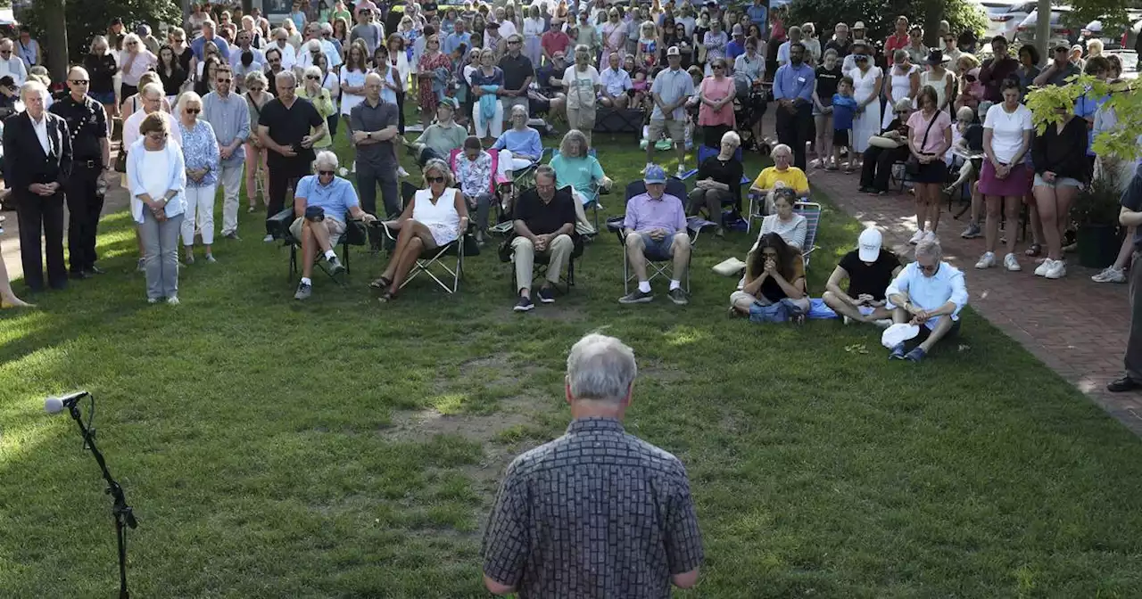 Hundreds gather at Lake Forest vigil for victims of Highland Park shooting