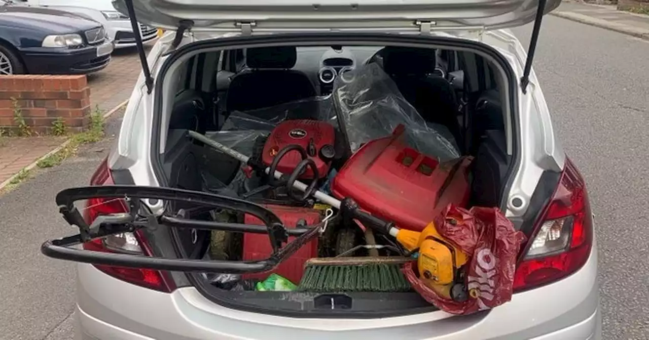 Driver stopped by police with a lawnmower and strimmer hanging out of their boot