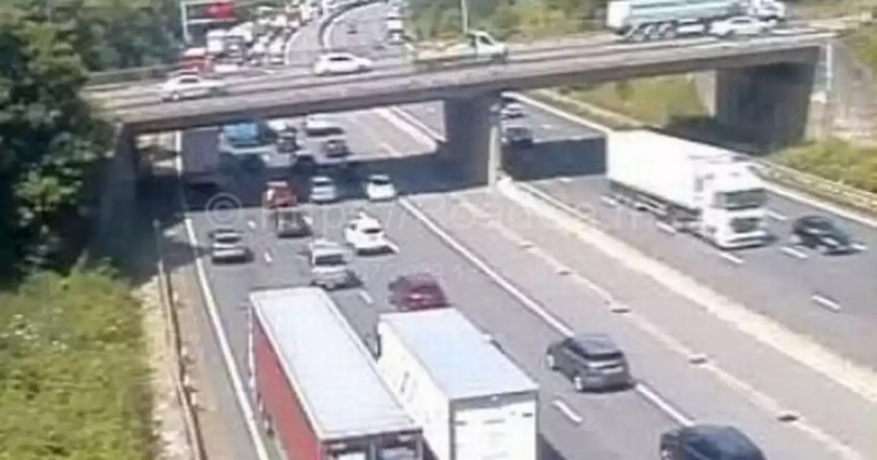 M1 multi-vehicle crash leaves spillage and at least 8 miles of traffic