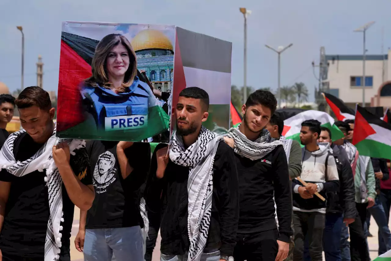 Family of journalist killed in West Bank lashes out at Biden