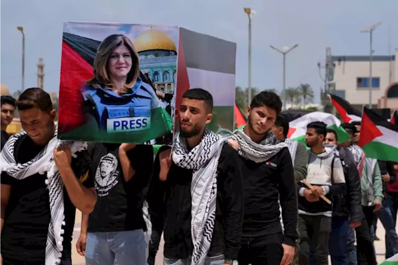 Family of journalist killed in West Bank lashes out at Biden