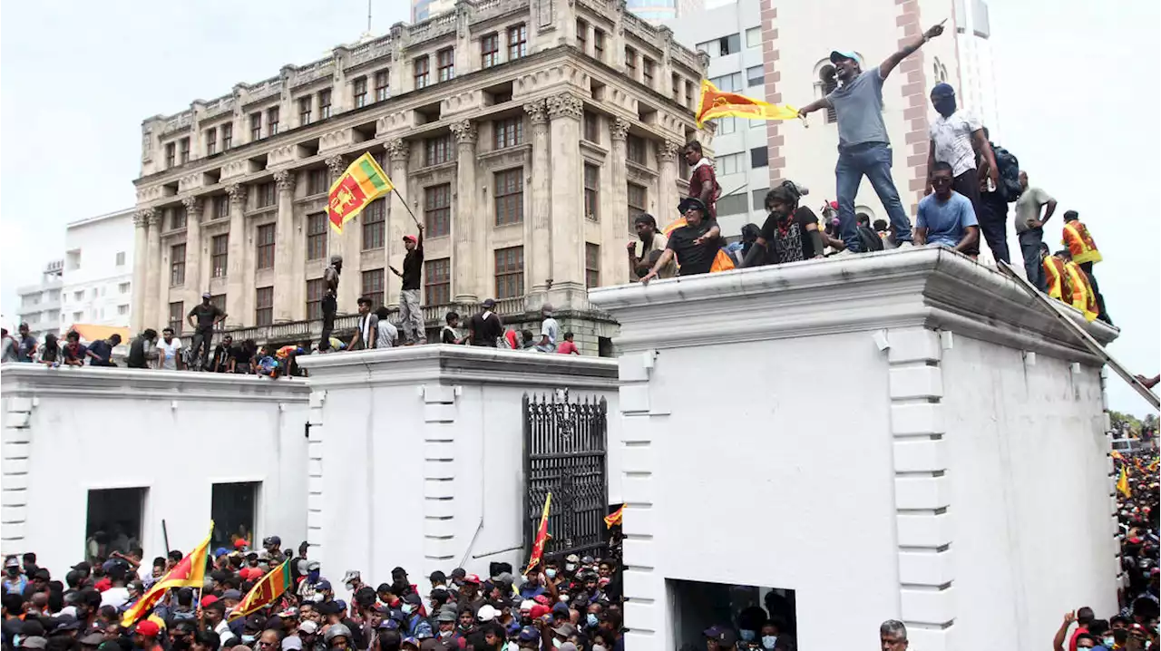 Sri Lanka protesters swim in president's pool after storming official residence