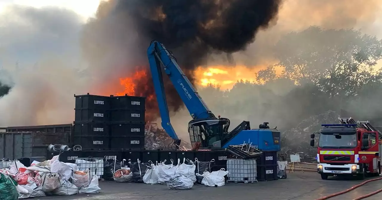 Smoke billows into air as fire crews tackle blaze at scrapyard