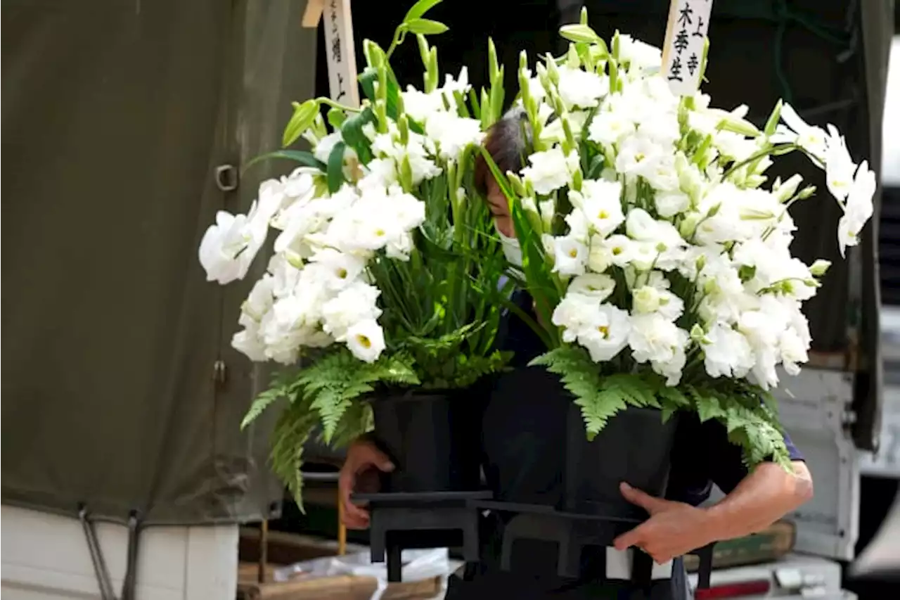 Abe's body arrives in Tokyo as country mourns ex-PM's death