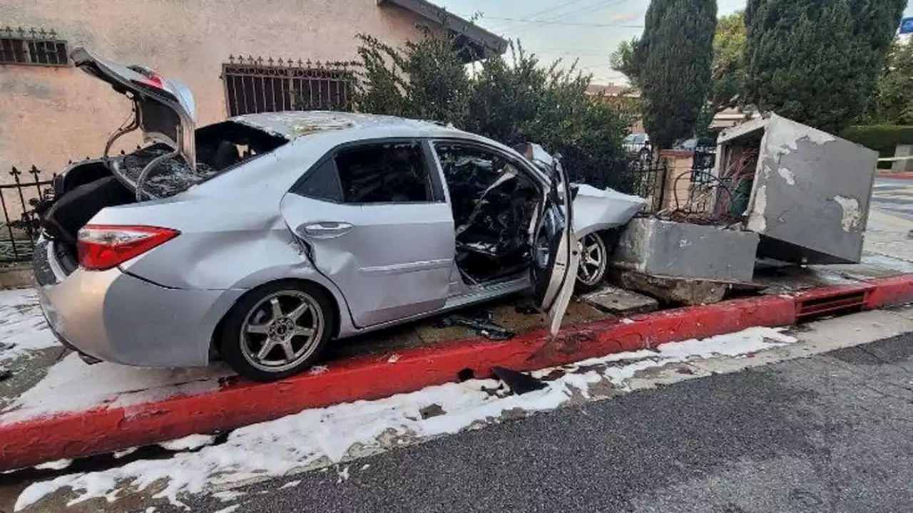 Woman rescued from burning car in Bell Gardens