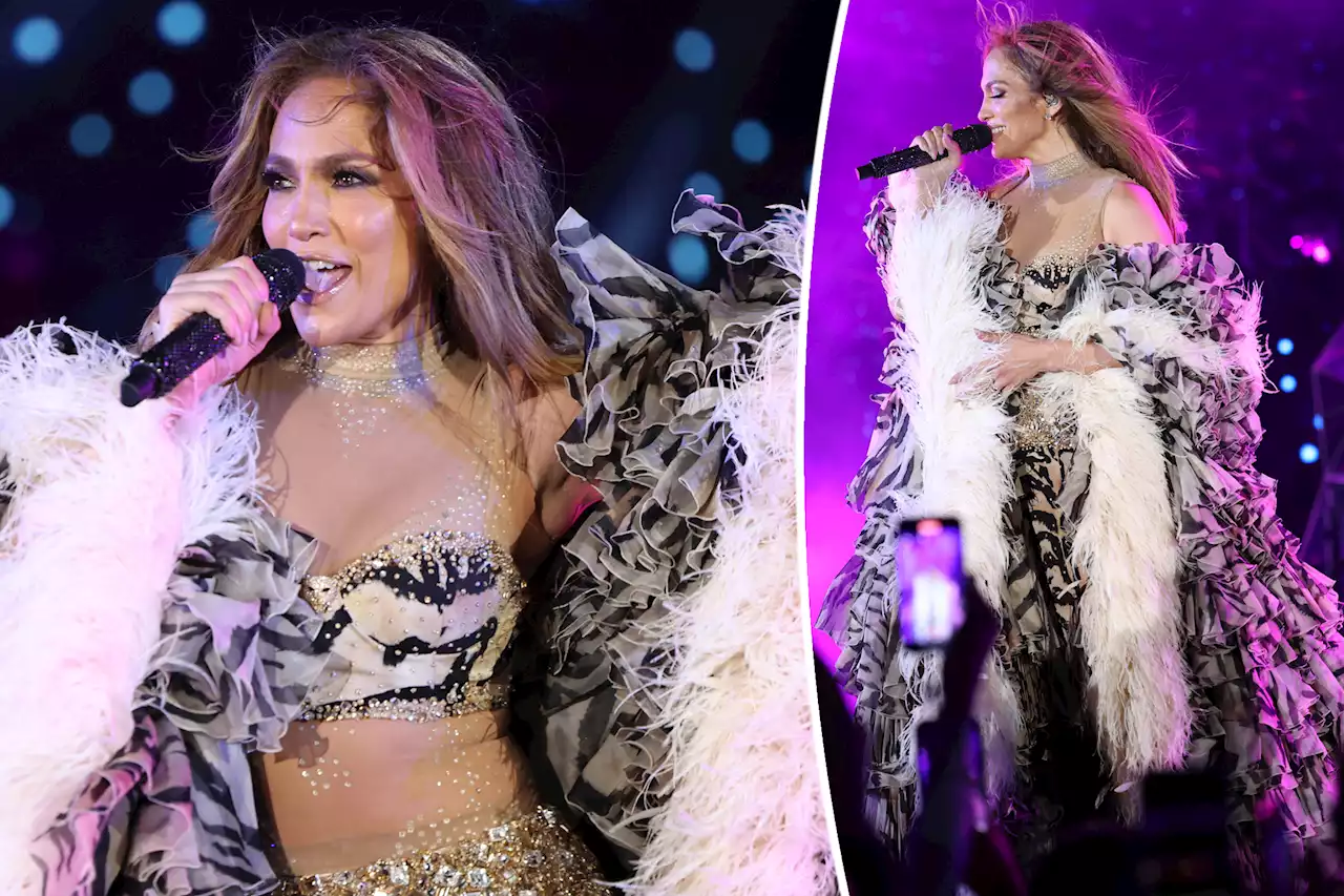 Jennifer Lopez performs in feathers and mesh at LuisaViaRoma x Unicef gala