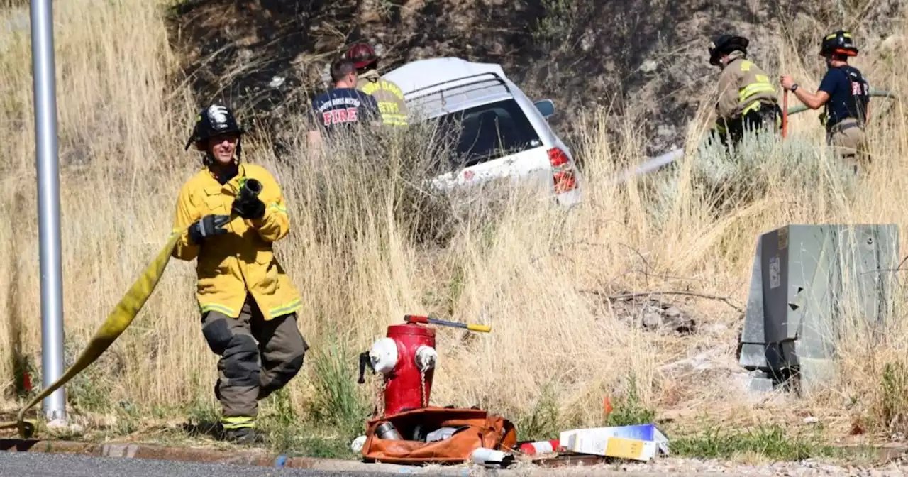 Driver narrowly misses 2 people and crashes car, starting small grass fire in Centerville