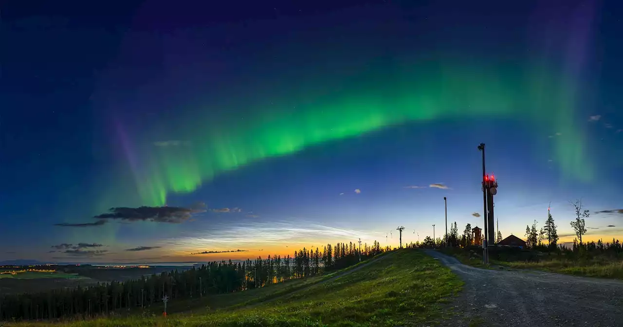 Rare Photo Captures Noctilucent Clouds and Aurora Borealis Together