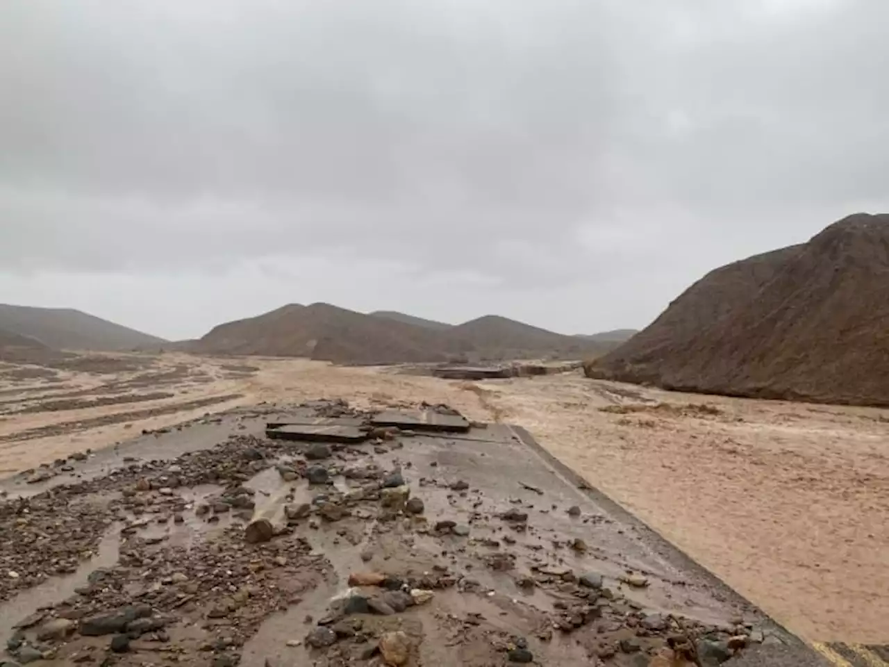 Death Valley route buried in floods closed for another week