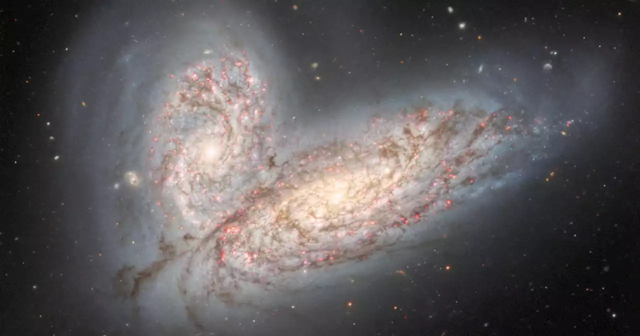 'Cosmic collision': A stunning photo of the galactic merging of two galaxies is a preview of what scientists say is to come for the Milky Way