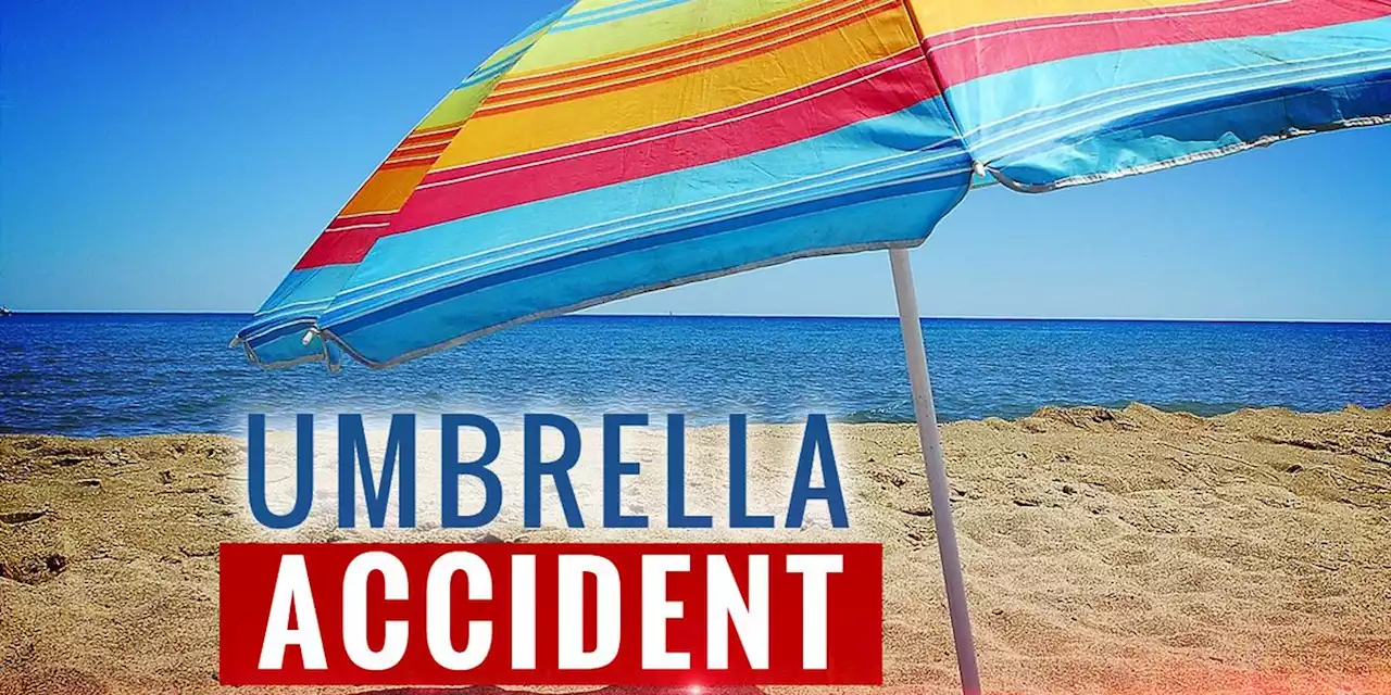 Woman dies after impaled by beach umbrella