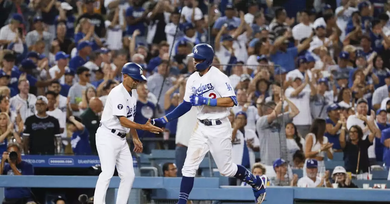 Dodgers rally past Twins to run the winning streak to 10