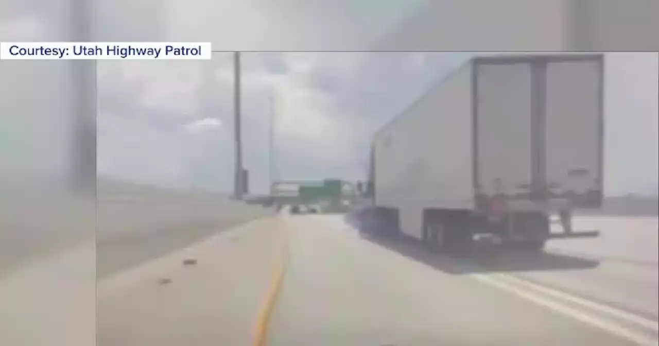 Dashcam video captures car hit by semi-truck on I-15