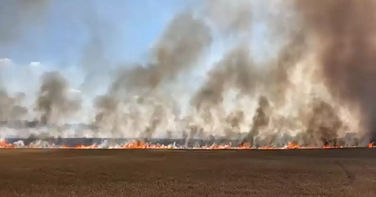 Live as major incident declared and 50 homes evacuated in village