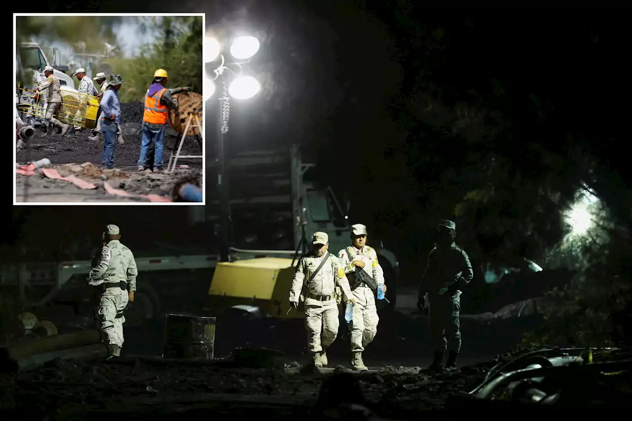 Darkness and debris impede rescue effort at flooded Mexico mine