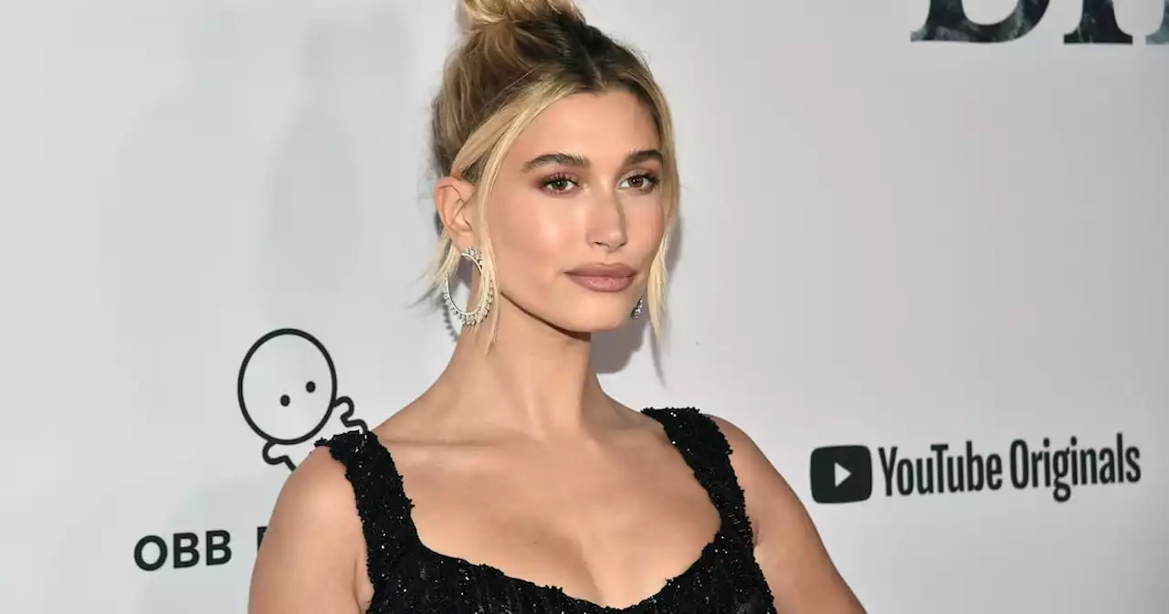 Hailey Bieber Poses in a Purple Bra and Crisscross Thong