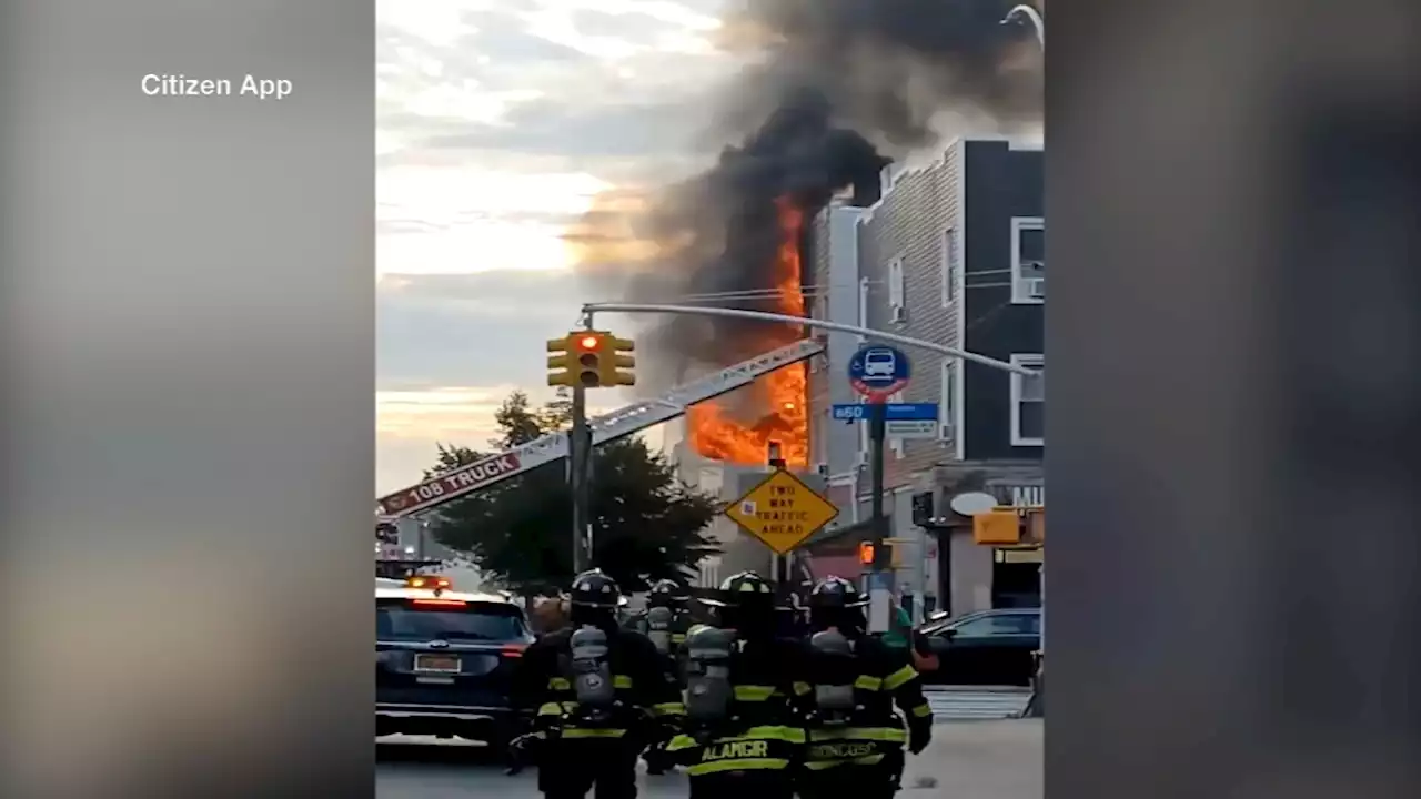 Fire tears through 3-story building, spreads to neighboring structure in NYC