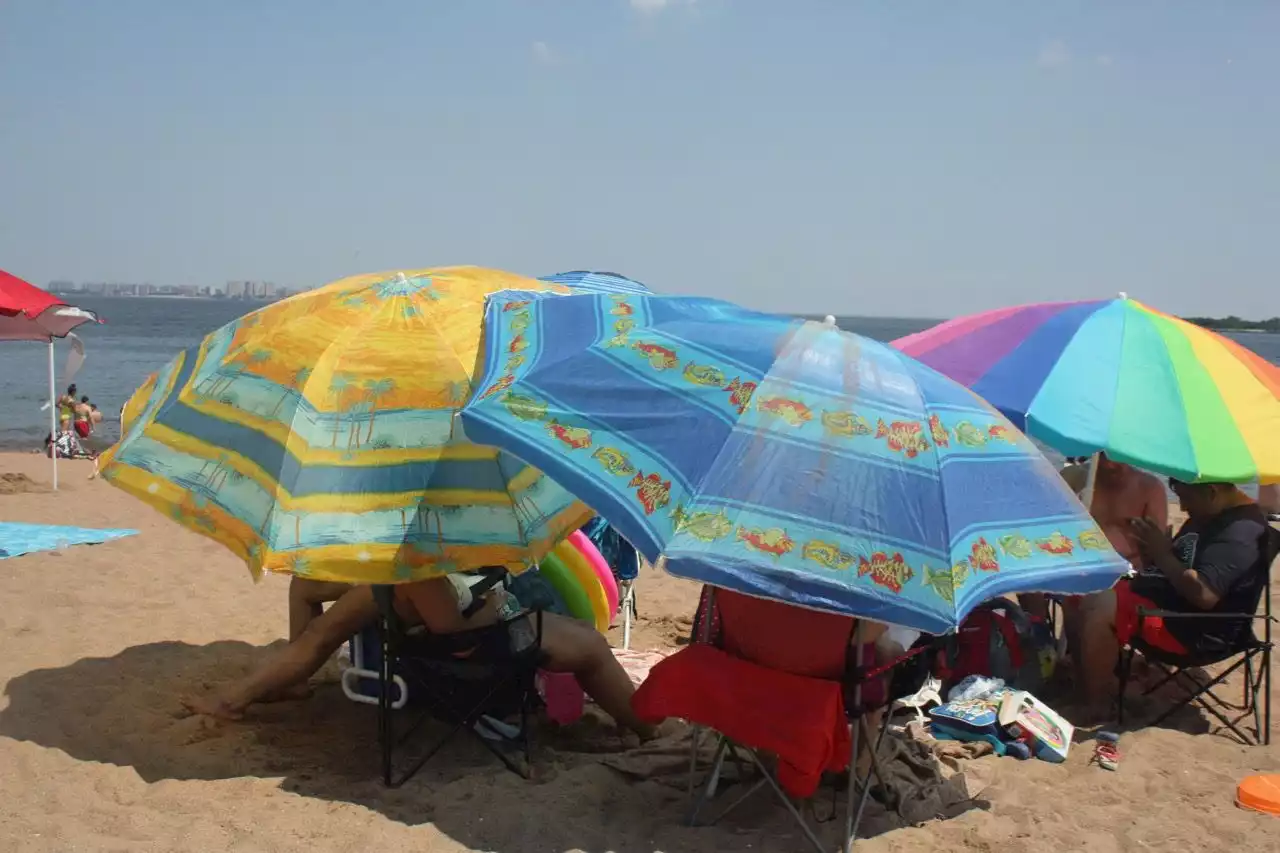 Woman dies after being impaled by beach umbrella on windy beach