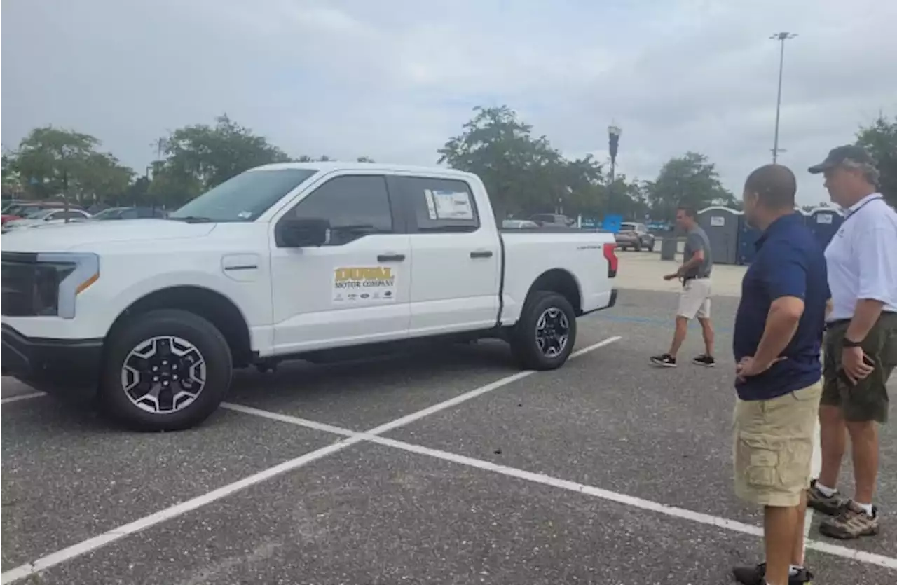 Drivers test electric vehicles at TIAA Bank Field