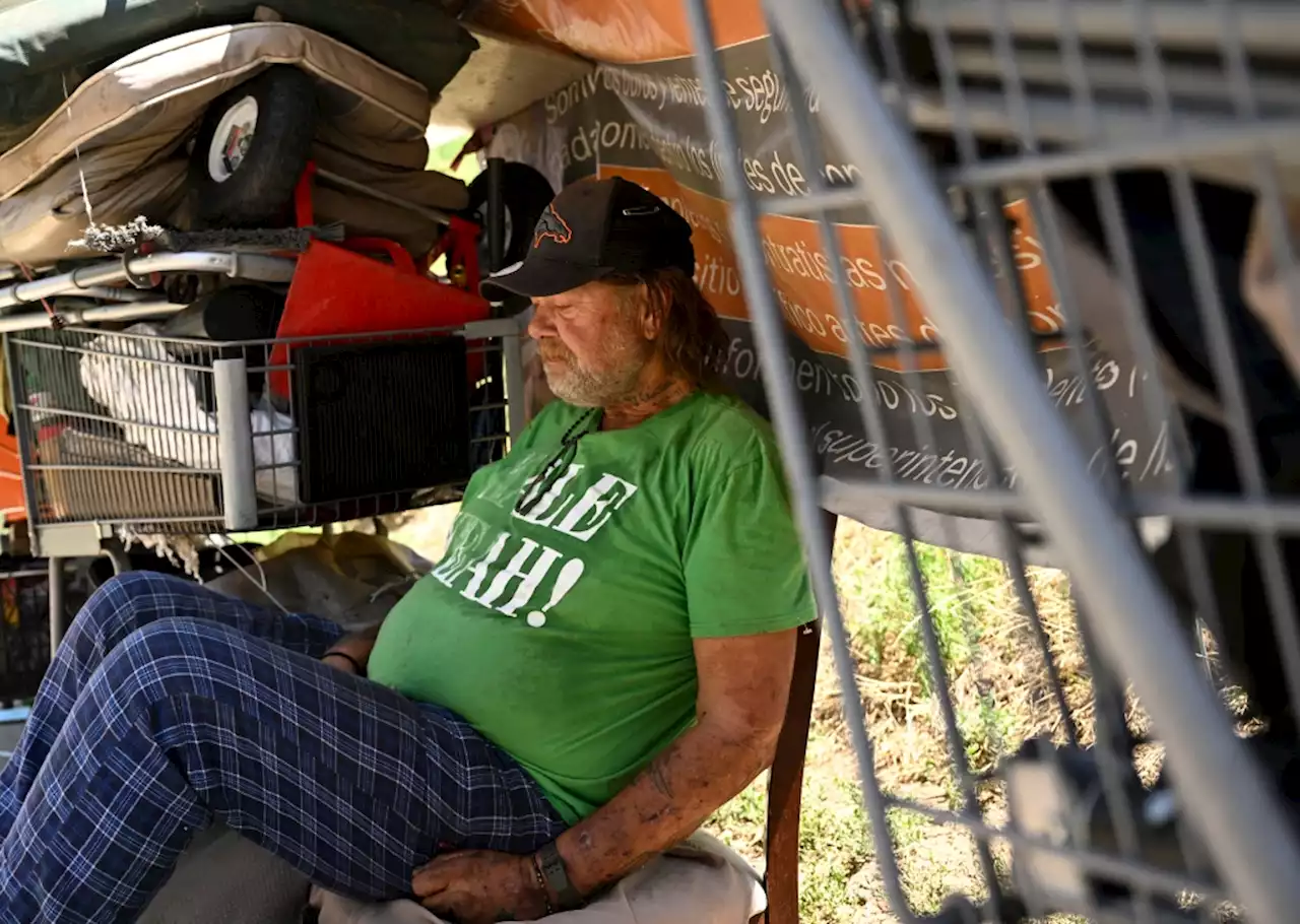 As summer temperatures soar, people living on Denver’s streets struggle to escape the heat