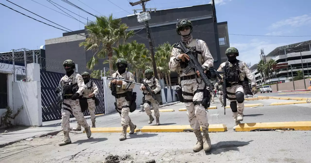 Troops patrol Tijuana as city emerges from cartel-fueled night of terror