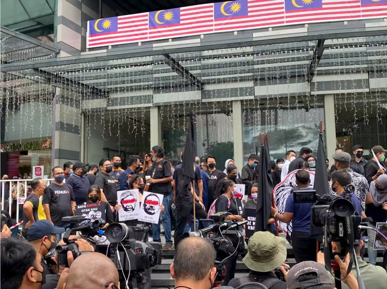 LCS protest: Dark clouds, crowd in black gather ahead of demonstration