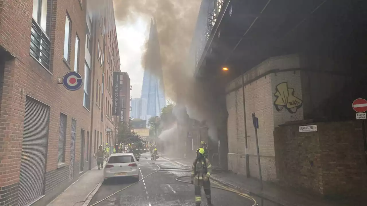 Firefighters tackle huge blaze in Southwark railway arches with train services 'severely disrupted'